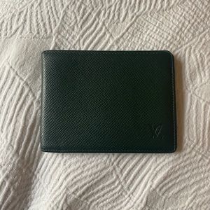 Louis Vuitton Tiaga Leather Slender Bi-fold Wallet in Green